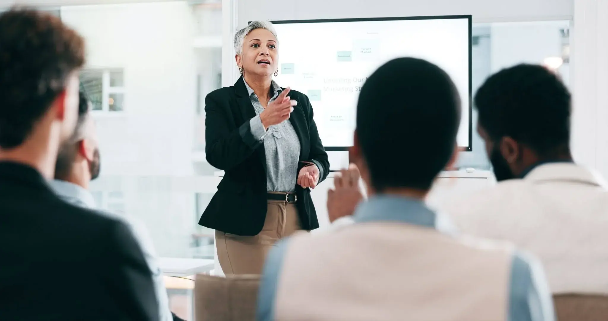 A woman conducting a training session after weighing the return on investment of the levy vs training sessions. 