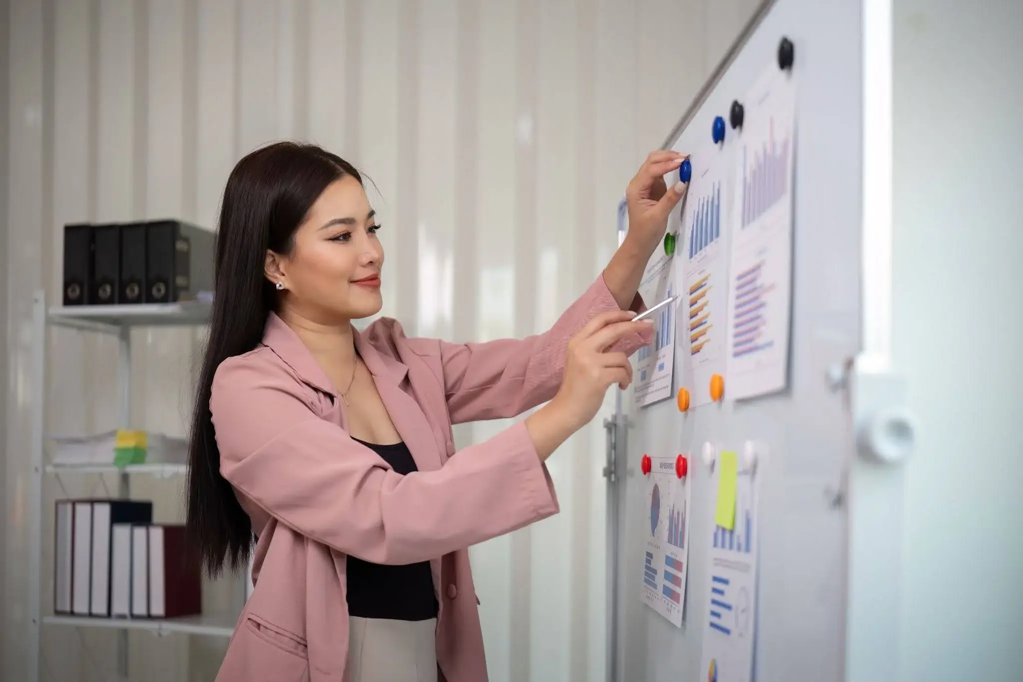 A multi-channel marketer analysing the marketing results of the business for that month.